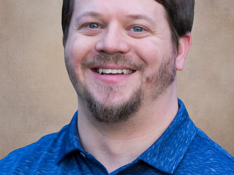 Portrait of Tim Larson, LPC.
